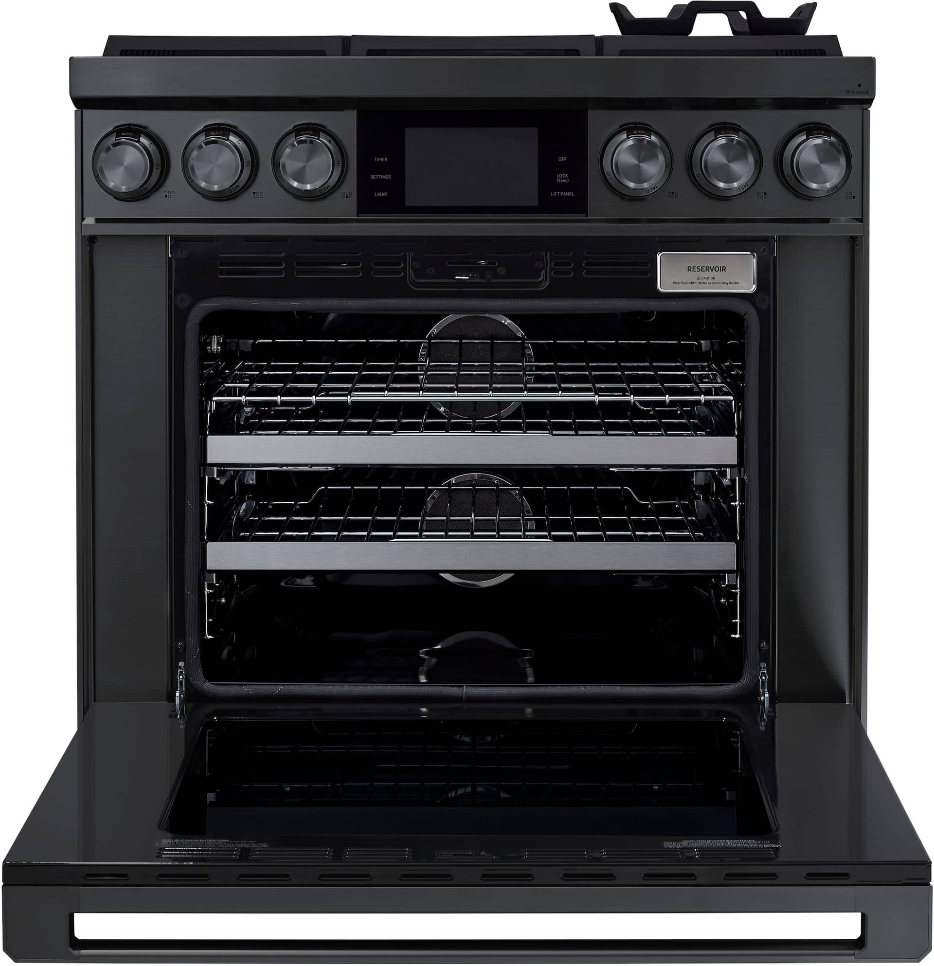 Oven cavity open showing glide racks and Dual Four-Part Pure Convection fans on Dacor DOP36C86DLM/DA